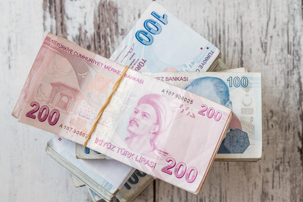 目前里拉与流通货币之间的汇率大概是多少？